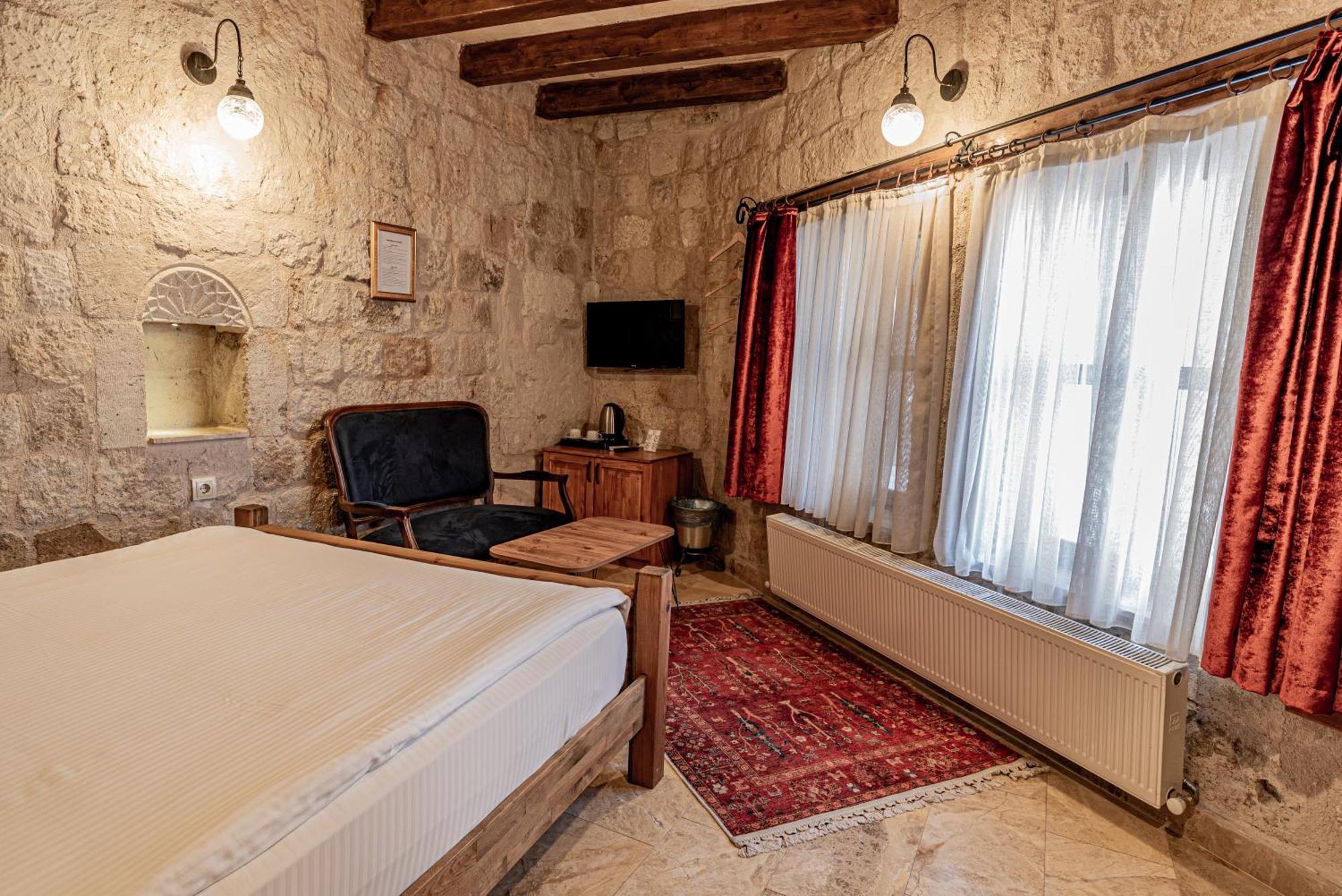 Dervish Cave House & Restaurant Гореме